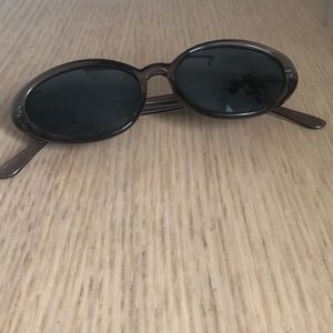 Grey oval frame sunglasses